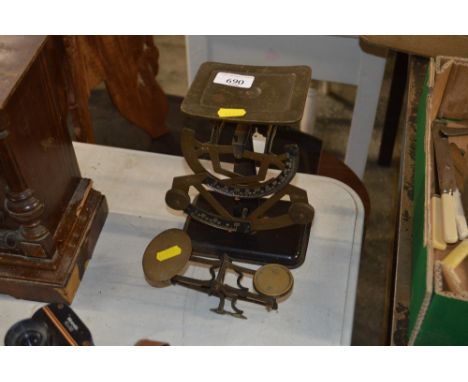 A set of scales and another part set of scales 