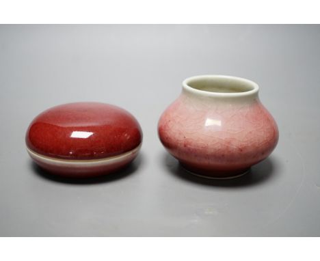 A Chinese sang de boeuf glazed seal paste box and a small pot (2) box 7.5cm diameter