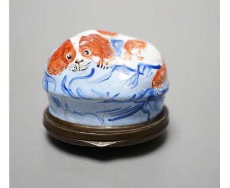 A Late 18th century South Staffordshire enamel patch box, 3.9cm, modelled as a spaniel recumbent on a cushion, the cover insc