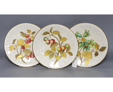 Three Royal Worcester Aesthetic period plates, with raised gilded and enamelled botanical decoration, on a floral ground, ori