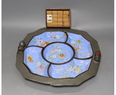 An early 20th century Chinese Guangzhou enamel supper set in a pewter tray, 35cm and a boxed set of bamboo and bone dominoes