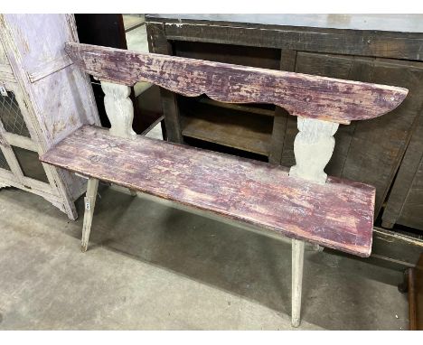 A Tyrolean style painted wood bench, length 142cm, depth 55cm, height 91cm