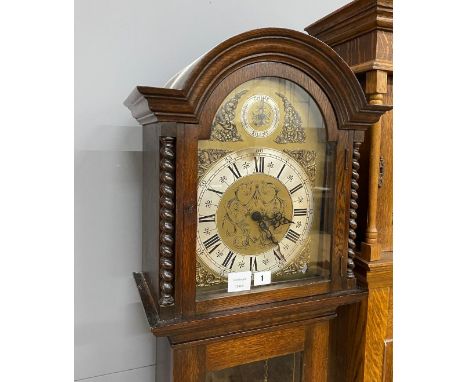 A modern eight day longcase clock, with strike/silent in the arch, height 193cm