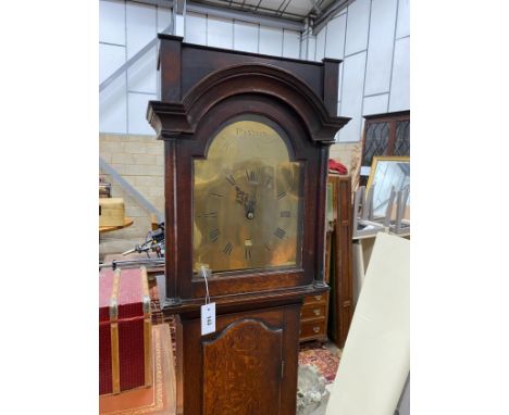 An early 19th century oak 30 hour longcase clock, the arched brass dial marked Paxton, Higham Ferrers, height 199cm