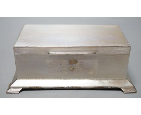 A George VI engine turned silver mounted rectangular cigarette box, Alexander Clark Co Ltd, Birmingham, 1948, with engraved i