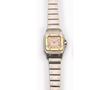 Cartier-Damenarmbanduhr "Santos de Cartier" Stahl und 18 ct. Gelbgold. Quadratisches Uhrengehäuse mit aufgeschraubter Lunette