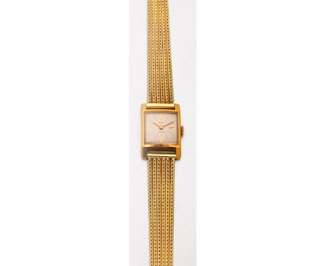 Golana-Damenarmbanduhr aus den 60er Jahren Gelbgold, gest. 750. Rechteckiges, leicht bombiertes Uhrengehäuse, satiniertes Zif