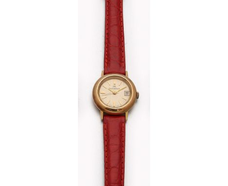 Bucherer-Damenarmbanduhr aus den 70er Jahren Gelbgold, gest.18 ct.; Rundes Uhrengehäuse, satiniertes Zifferblatt mit Stabinde