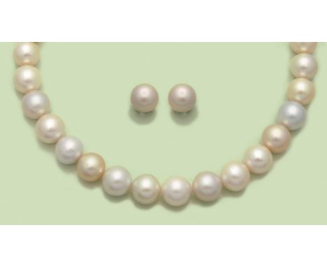 Klassisches Südsee-Perlparure Gelbgold, gest. 585. Einreihige sog. Princess-Kette aus insges. 31 schneeweißen, gelbweißen, cr