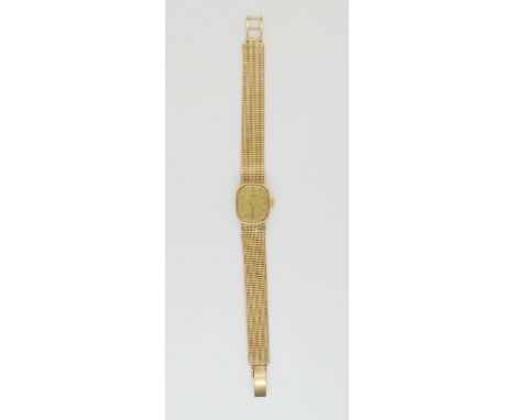 A 9ct gold ladies Rotary watch with integral mesh strap, weight including mechanism 25.8gms Condition Report:Available upon r
