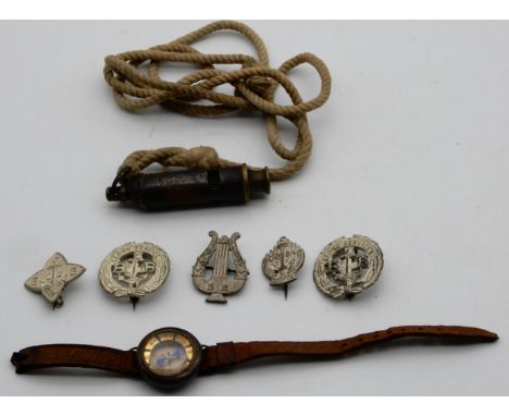 A leather strapped (def) wrist worn compass together with various Boy's Brigade badges and a Boy Scout whistle Condition Repo