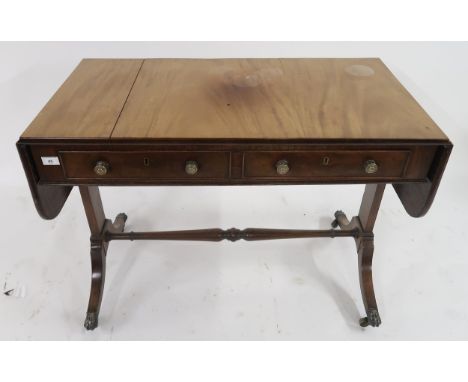 A 20th century mahogany sofa table Condition Report:Available upon request