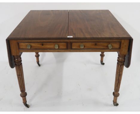 A Victorian mahogany sofa table with two drawers on turned supports Condition Report:Available upon request