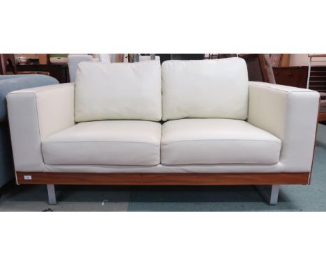 A modern Dwell white leather and teak framed two seater sofa, 80cm high x 158cm wide x 86cm deep Condition Report:Available u