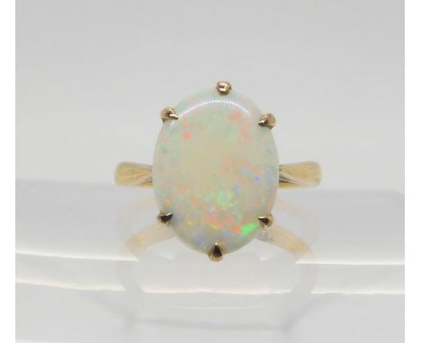 A 9ct gold white opal ring, size L1/2, weight 3.3gms Condition Report:Available upon request