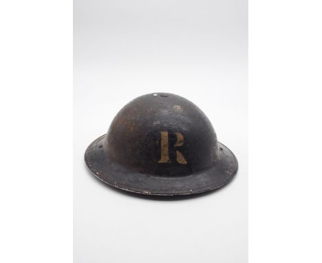 A WW2 civil defence helmet Condition Report:Available upon request