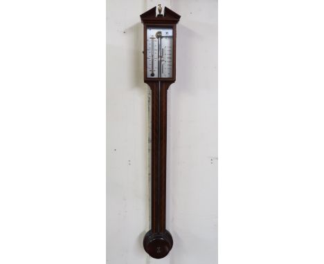 A 20th century mahogany cased barometer/thermometer, 97cm high and a 20th century child's chair (2) Condition Report:Availabl