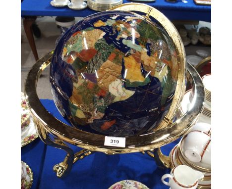 A hardstone globe of the world Condition Report:Available upon request