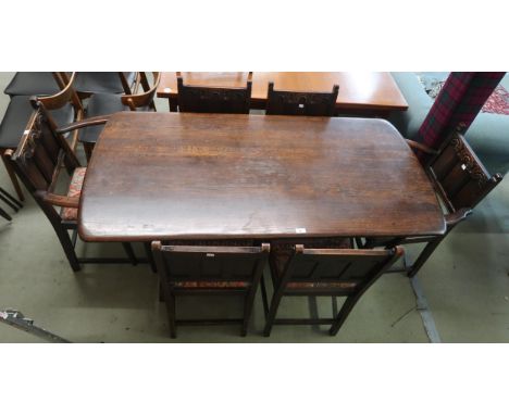 A mid 20th century Ercol elm and beech "colonial" dining table and six chairs and an Ercol occasional table (8) Condition Rep