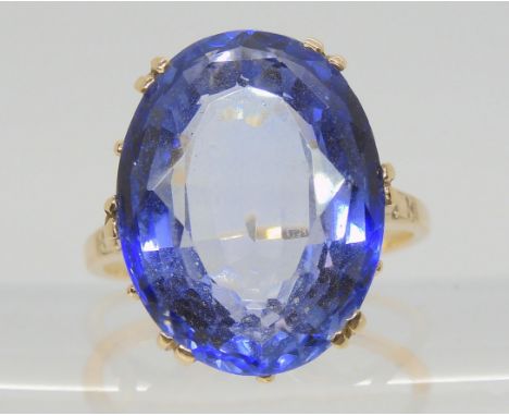 A 9ct gold blue glass gem statement ring, size R, weight 7.6gms Condition Report:Available upon request