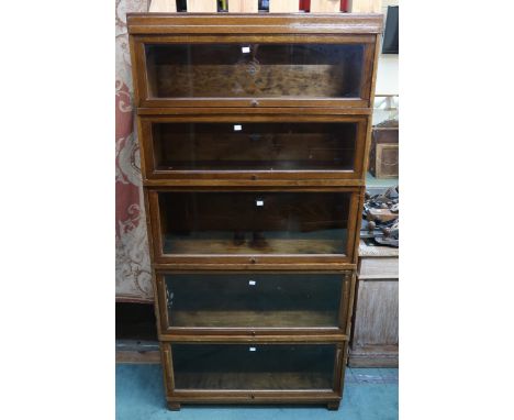 A 20th century stained oak Globe Wernicke ltd five tier sectional bookcase, 178cm high x 85cm wide x 29cm deep Condition Repo