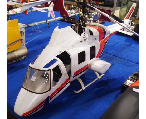 A part remote controlled model helicopter. Condition Report:Available upon request