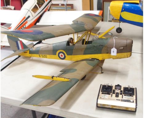 A Tiger Moth type model aircraft wingspan 1.2m with a remote control unit Condition Report:Available upon request