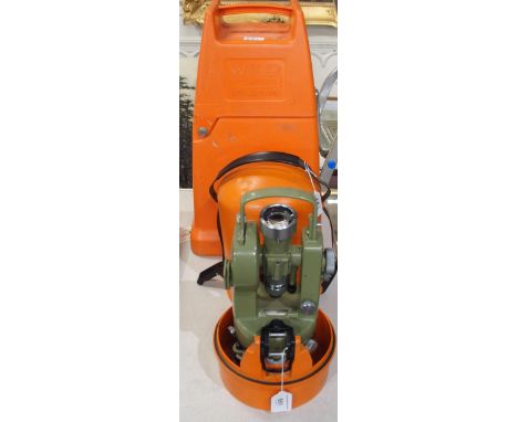 A theodolite by Wild Heerbrugg T1 circa 1983 marked F. Nr. 278732 with orange dome inner case and outer carry case Condition 