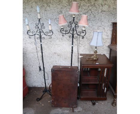 A mixed lot to include pair of metal standard lamps, revolving bookcase, table lamp and a leather suitcase (5) Condition Repo