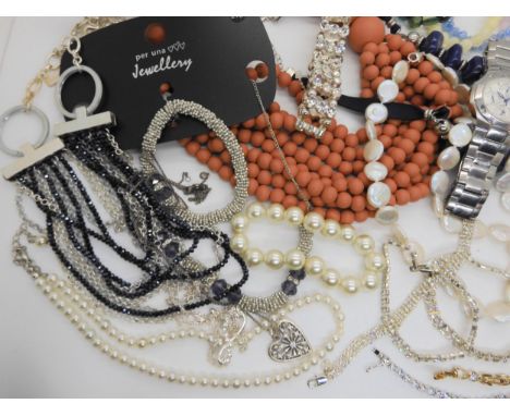 A collection of thrupenny bits, costume jewellery and watches to include a button pearl necklace and bracelet with silver cla