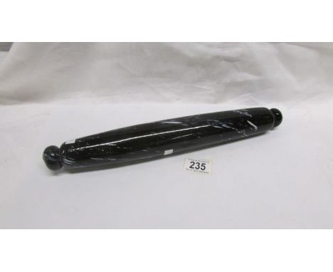 A Nailsea glass rolling pin