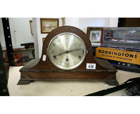 A wooden mantel clock
