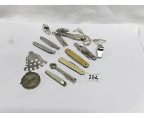 A mixed lot of penknives, a bosun's whistle, 2 Acme whistles and a compass