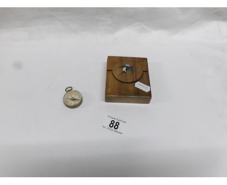 A treen pocket watch case and a small compass