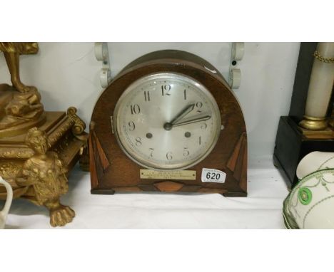 A 1930's mantel clock with pendulum