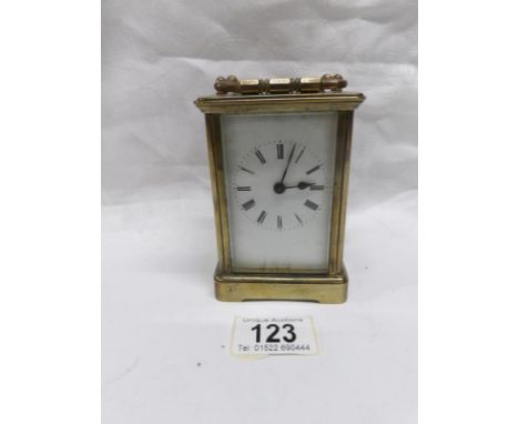 A brass carriage clock