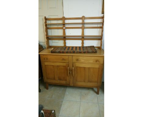 An Ercol style teak dresser