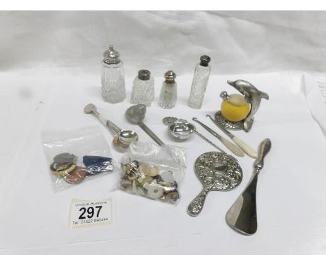 A mixed lot of silver topped bottles, an interesting caddy spoon, collar studs, teaspoons with silver coin ends etc