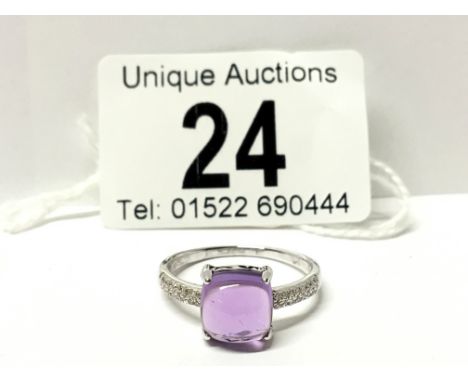 An 18ct white gold amethyst and diamond ring, size 0