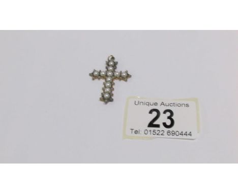 A diamond and pearl cross