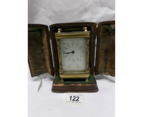 A brass carriage clock in original case
