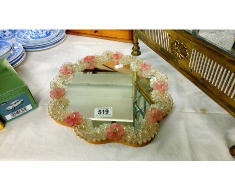 A Murano glass mirror