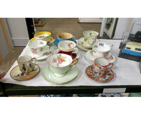 9 various tea cups and saucers