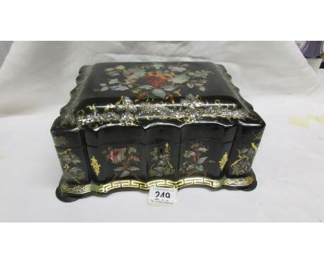 A beautiful papier mache' Victorian black lacquer work box decorated with mother of pearl, hand painted and gilded, in origin