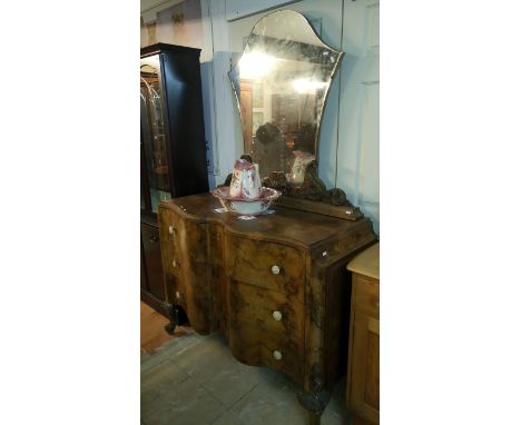 A Victorian serpentine front walnut veneered mirror back 3 drawer chest