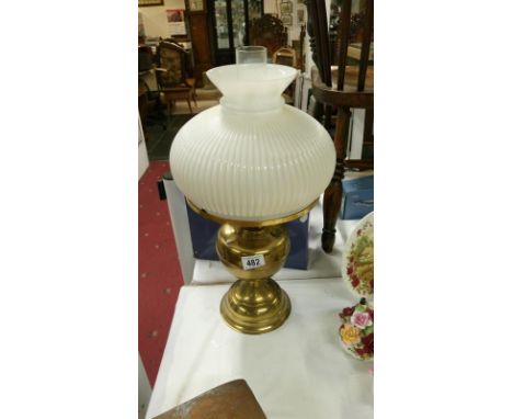 A table oil lamp with brass base