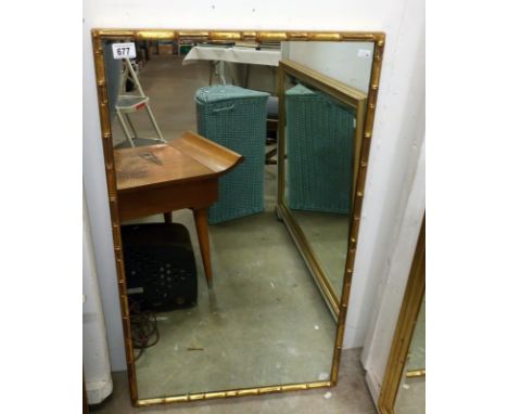 A bamboo effect gilt framed mirror