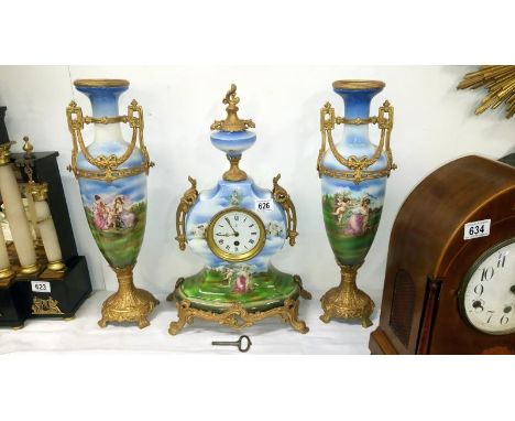 A 3 piece ceramic clock set