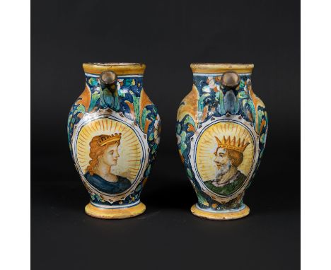 Two Venetian Pharmacy Jugs , in balluster shape, each with one handgrip spout and small neck on extended base, ceramic with m
