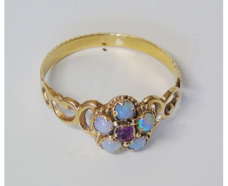 Opal and amethyst yellow gold ring. Condition reports cannot be done for our Interiors sales.